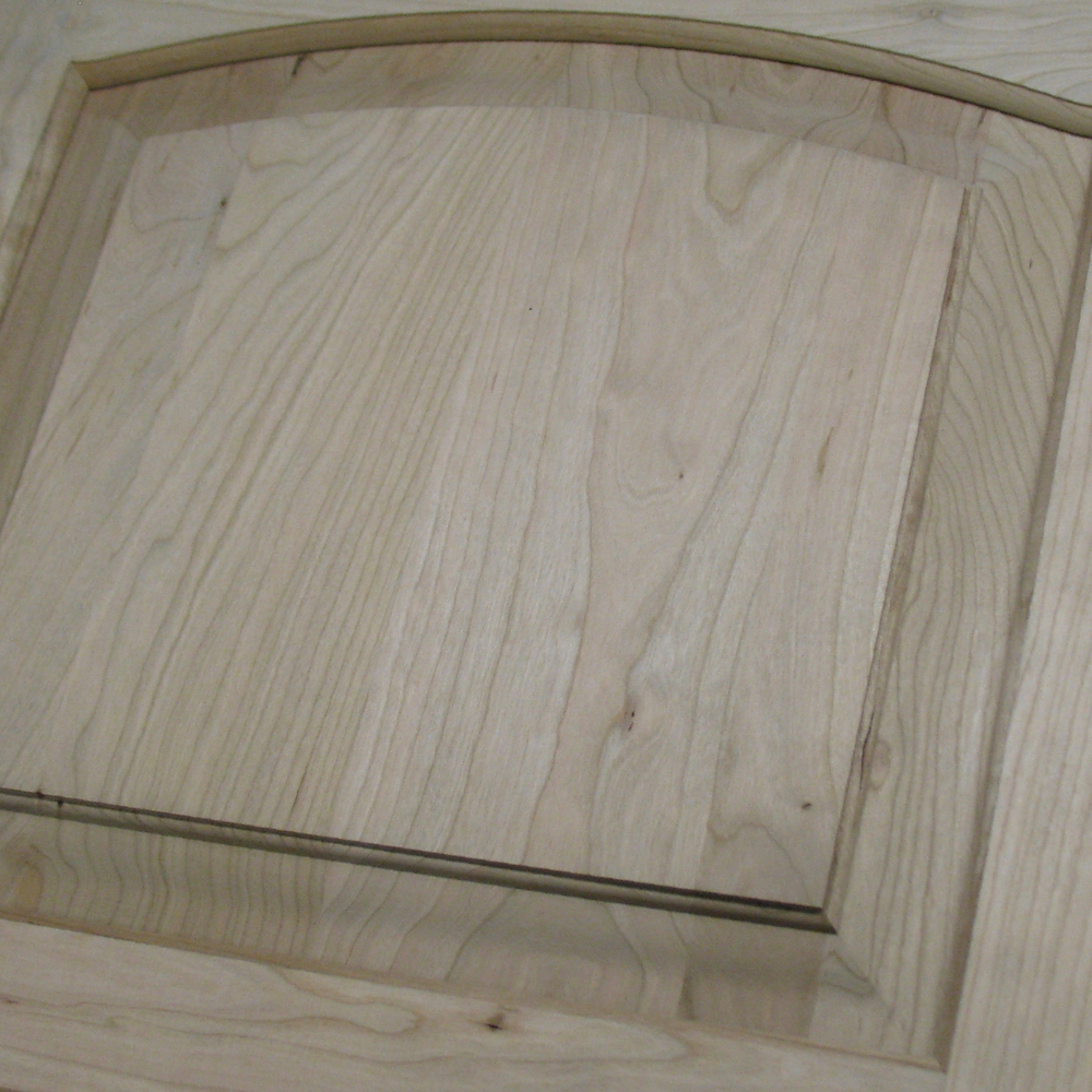 Detailed view of a wooden cabinet door